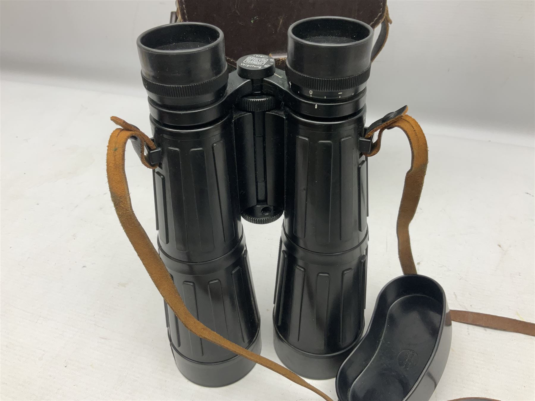 Pair of Optolyth 12 x 63 binoculars, made in Germany, serial no 82186, in leather case