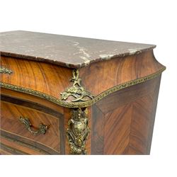 Mid-20th century Louis XVI design Kingwood and walnut secretaire à Abattant, shaped serpentine form with dark rouge variegated marble top, the fall front disguised as three drawers enclosing birdseye maple interior with shelf, drawers and writing surface, four functioning drawers below, decorated with cast gilt metal mouldings and mask cartouches, on skirted base with egg and dart moulded gilt metal edge