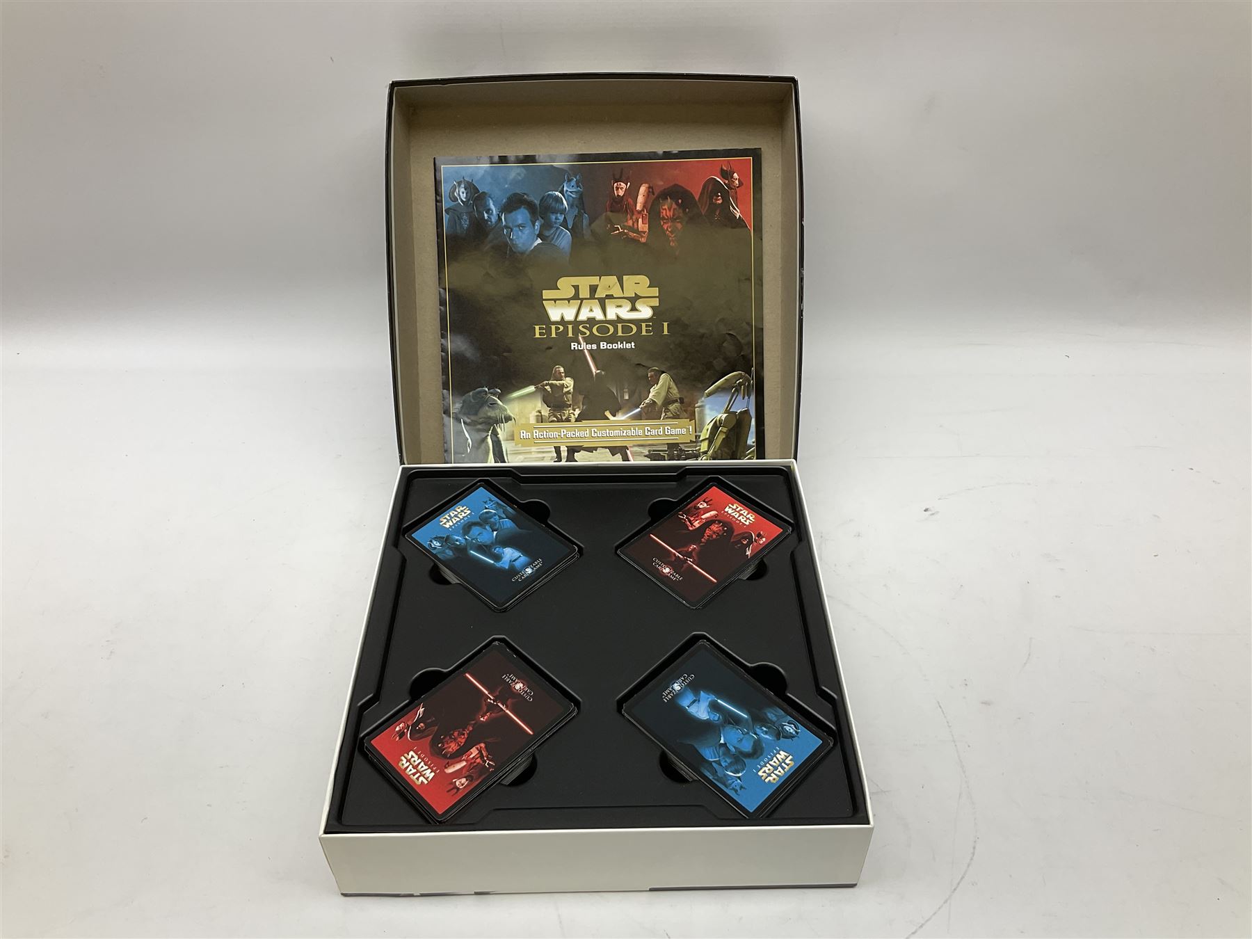 Star Wars - Disney Store The Force Awakens figurine playset, Poe's X-Wing Fighter, Snowspeeder and First Order Tie Fighter; Solo figurine set; The Last Jedi Elite Series die-cast action figure of Praetorian Guard; all mint and boxed; together with Star Wars Episode 1 card game, boxed (7)