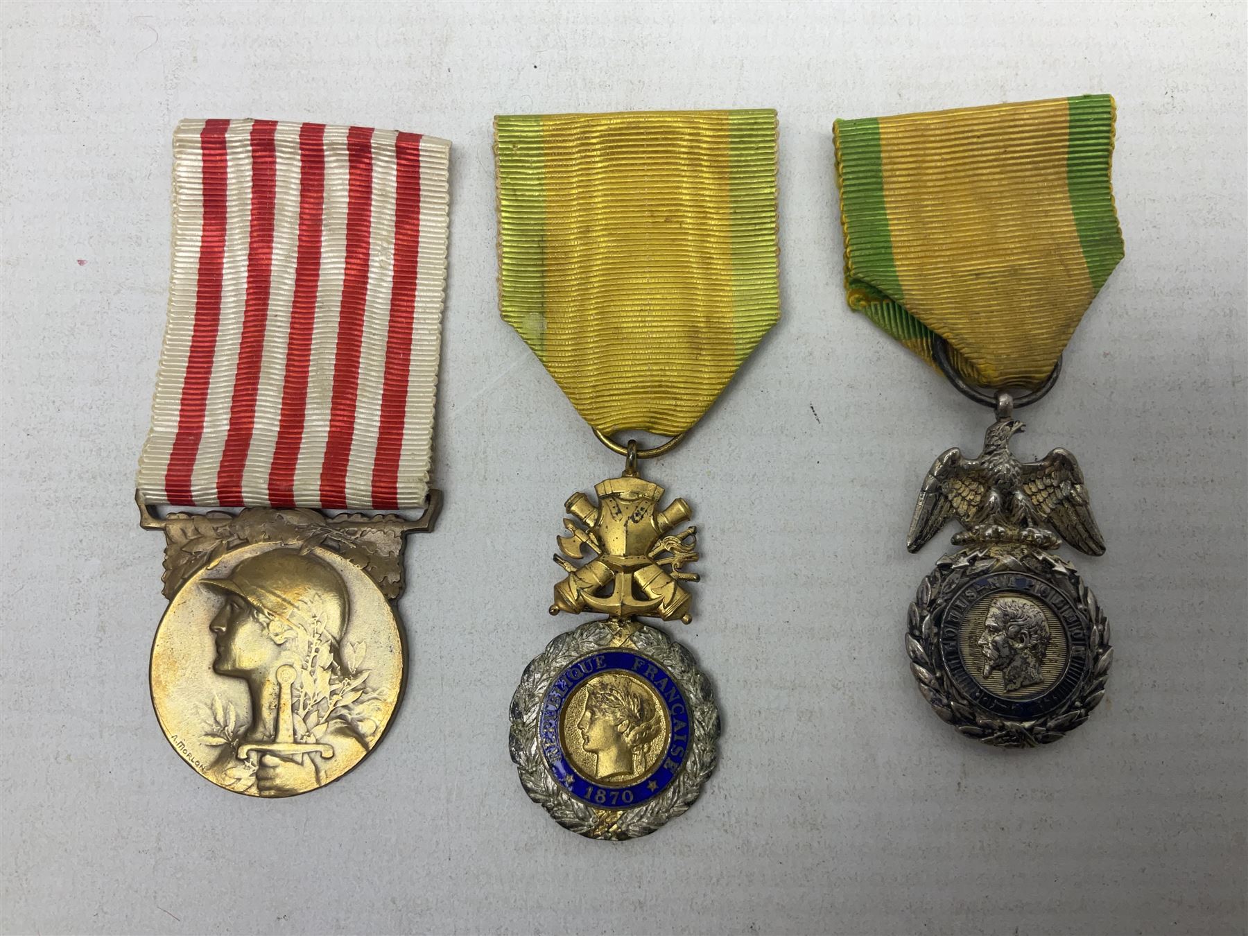 Six French medals - 2nd Empire Louis-Naploeon Medaille Militaire Valeur Et Discipline; 1870 3rd Republic Medaille Militaire Valeur Et Discipline; WW1 Croix-De-Guerre with MID star; WW2 Theatres D'Operations Exterieurs Croix-De-Guerre; WW1 Commemorative Medal; and Croix De La Valeur Militaire; all with ribbons (6)