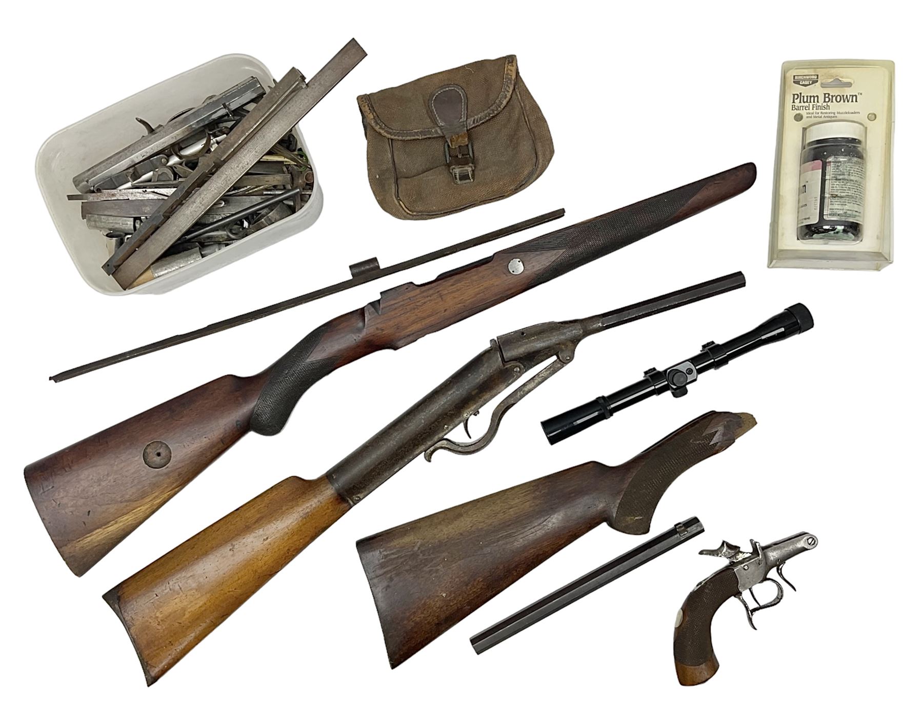 Assorted rifle and pistol spares; early Gem air rifle with sawn off barrel (piece present); telescopic sight; canvas/leather ammunition pouch; Mauser stock; barrel browning solution etc