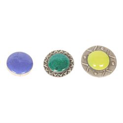 Six brooches, including one Ruskin example in silver mount, four Ruskin style brooches with ceramic roundels and a plated agate example