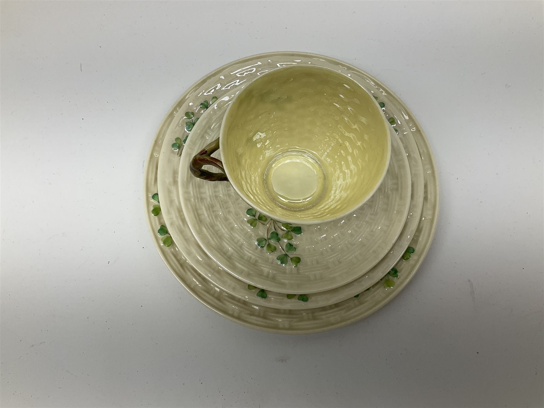 Two Royal Crown Derby pattern Imari soup bowls, pattern 2451, Belleek Fermanagh Ireland four piece set in green shamrock pattern, Royal Doulton small lady figure, Marie HN1370, large Wedgwood fruit bowl, Sylvac jardiniere in autumn leaves pattern, five pieces Co-operative Society commemorative ceramics, with selection of other ceramics. 