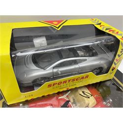 Seventeen Shell Sportscar Collection die-cast models including 1:24 scale Jaguar XJ220 by Maisto; and Bburago 1:20 scale die-cast model Mercedes Benz 500K Roadster (1936); all boxed (18)