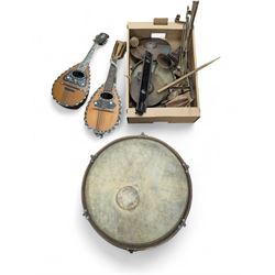 Two bowl back mandolins and a part drum kit 