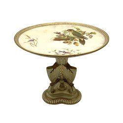 19th century Royal Worcester dessert tazza, the circular top hand painted with birds to each side, upon a trefoil base and stem with three supports in the form of butterflies, heightened with gilt throughout, with puce printed mark beneath, H19.5cm D24cm