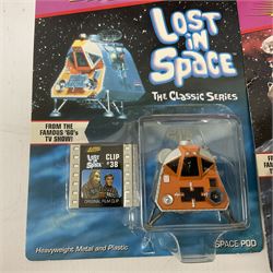 'Lost in Space' robot by Newline Productions; and three unopened  'Lost in Space' carded models; and five other robots comprising Tommy The Atomic Robot; Saturn The 13