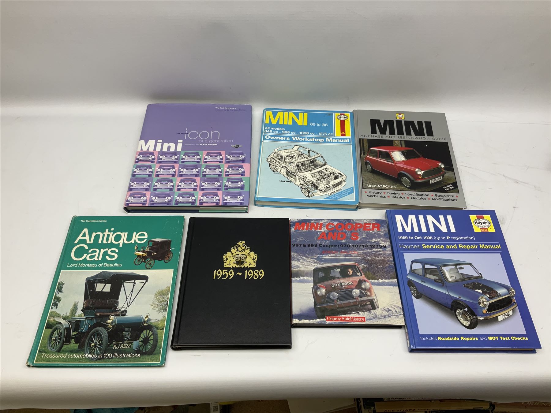 Automobilia - collection of books and ephemera on Mini Cars including BMC Special Tuning Folder for Mini-Cooper 'S', 1972 Handbook, Austin and Morris Mini Cars by Sydney Page 1962, Haynes Manuals, Mechanical Parts Catalogue 1998, thirty and forty years commemorative books, Austin Rover Service and Parts Correspondence Course 1977, video tape and DVD etc (27)