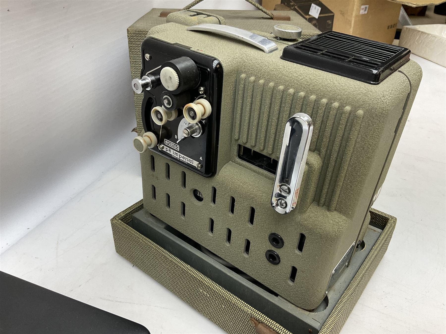 Boxed Zeiss Ikon compact projector, boxed, together with Eumig P8 Imperial projector in case