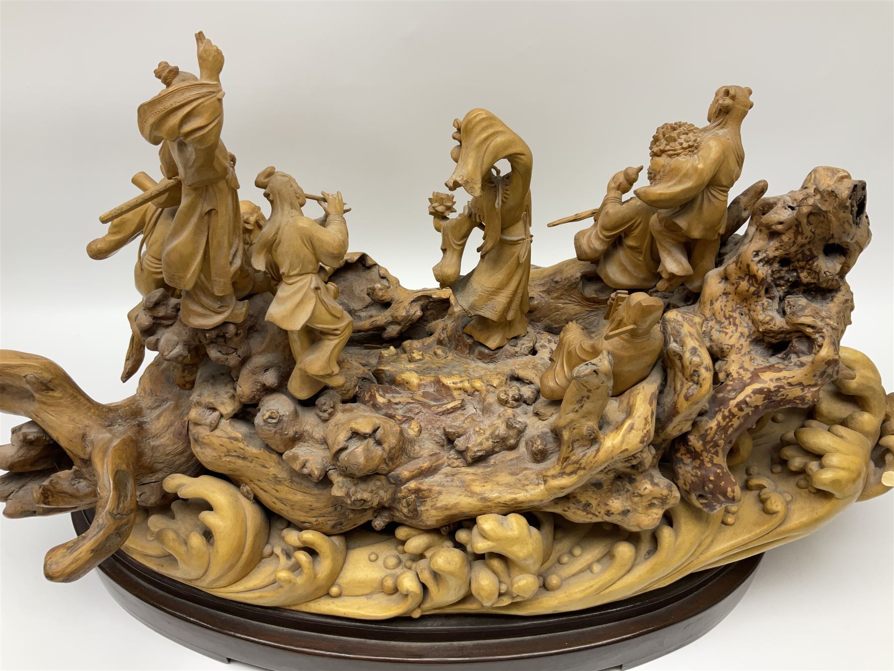 Large Chinese wood carving, depicting the eight immortals crossing the sea, H46cm, L78cm 