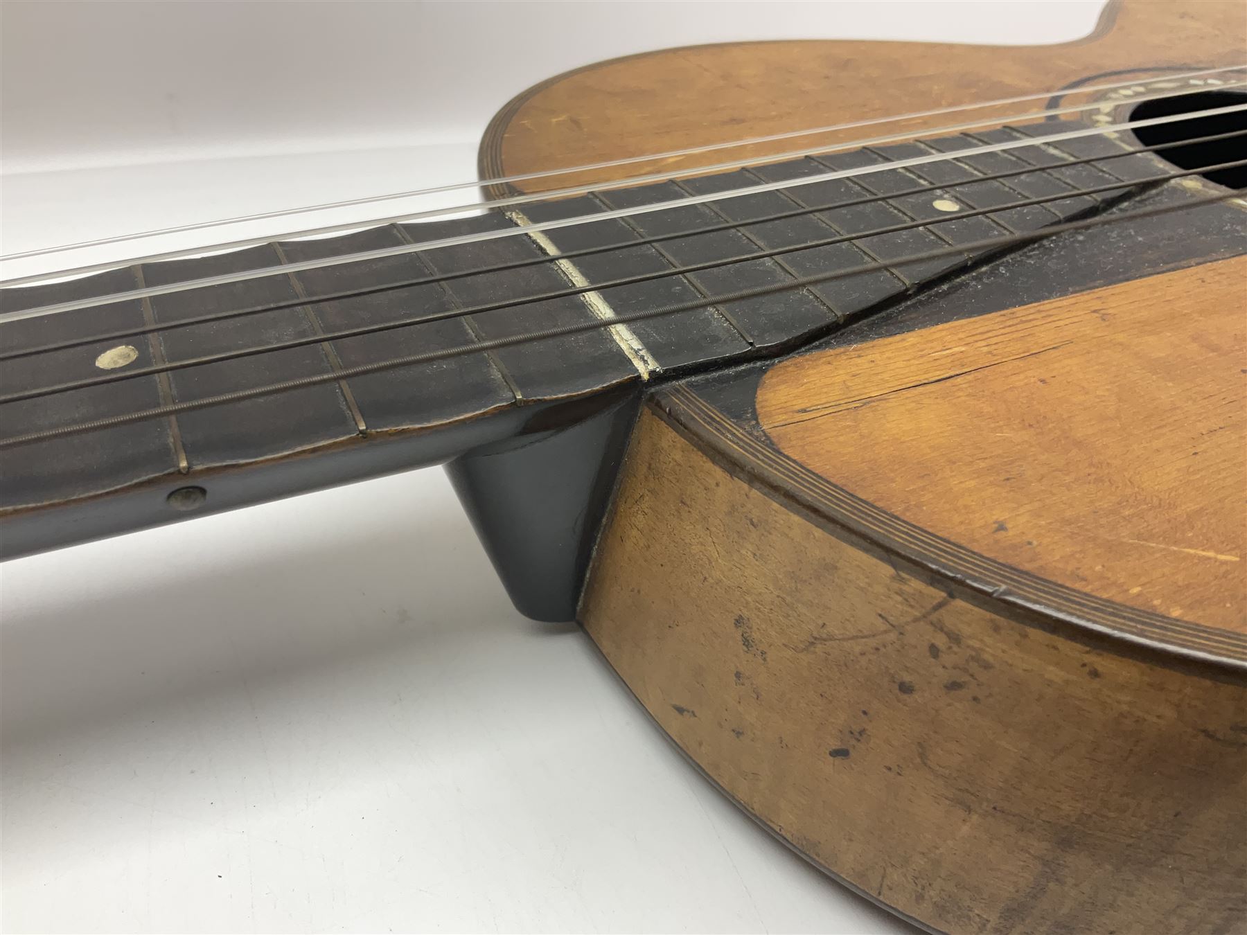 19th century Continental parlour guitar for restoration or display, with maple back and sides,  spruce top, scalloped neck and bone pegs; bears inset plaque to head 'Lapaix Paris 1830' and 'John Eastwood Teacher of the Guitar' paper label with manuscript note 'Fine Old Guitar Restored 1888 by JCB Leeds' L92cm