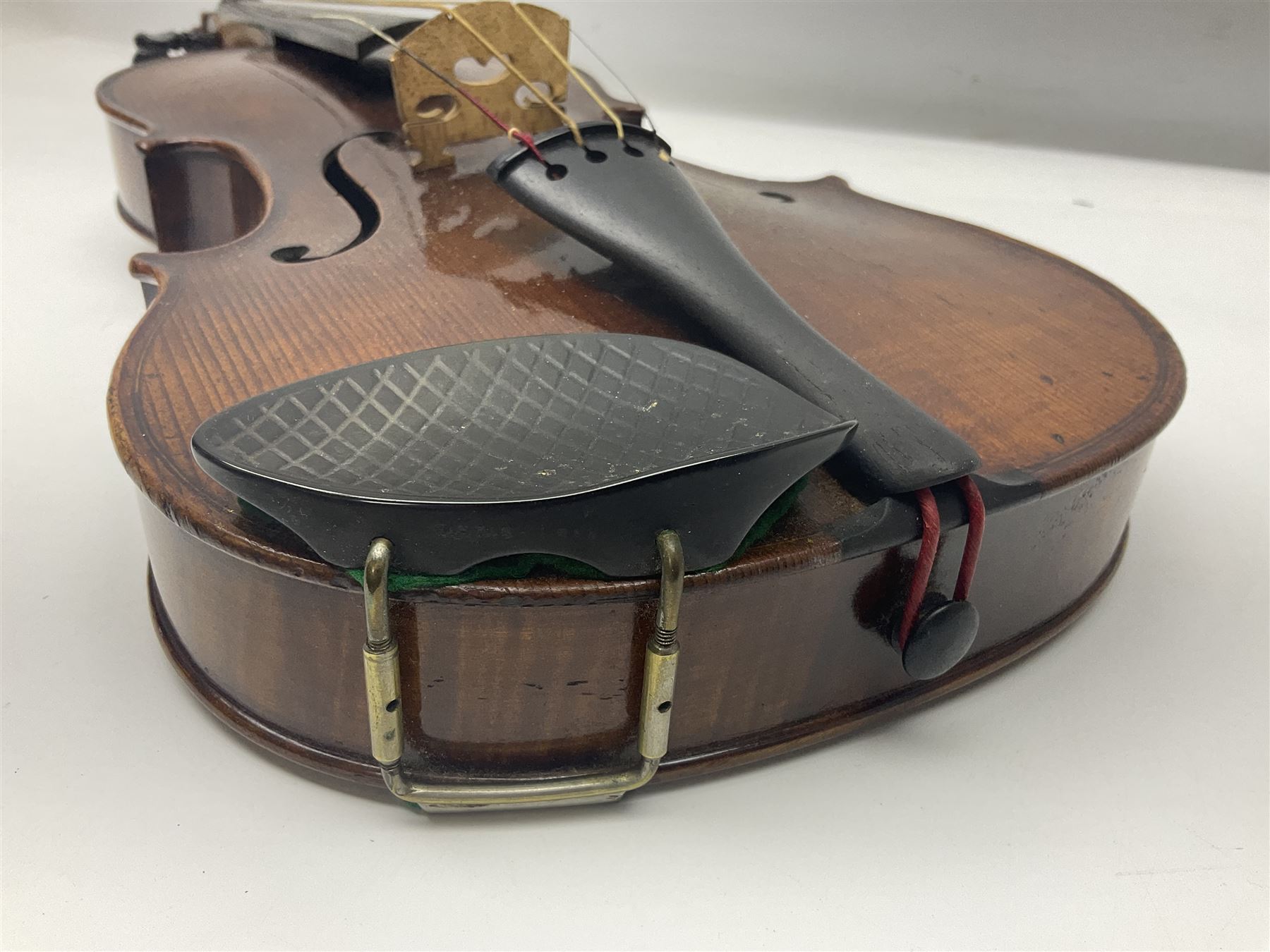 German trade violin c1900 with 35.5cm two-piece maple back and spruce top; bears label 'Made in Germany Apollo Class 6 No.2132' L59cm; in carrying case with two bows