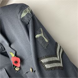 Two post-WWII British Army No.2 Dress tunics, one with Green Howards buttons; army shirt dated 1951; Royal Fleet Auxilliary jacket with trousers; three RAF/WAAF uniforms and RAF Greatcoat; and three canvas/webbing bags, two dated 1943 & 1945