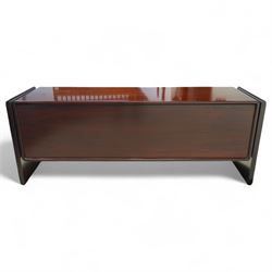 Dyrlund  - contemporary Santos rosewood office sideboard of minimalist form with clean lines, rectangular top with integrated side supports, left side with two drawers, and right side with a filing drawer, all enclosed by sliding doors


Note: Dyrlund is a Danish furniture manufacturer known for its high-quality, handcrafted pieces, particularly in the mid-century modern style. Founded in 1960 by Frits Hjerte Dyrlund in Rude, Denmark, the company has remained a family business, now run by the second and third generations. Dyrlund specializes in both home and executive office furniture, focusing on practicality, solid construction, and classic design. 
