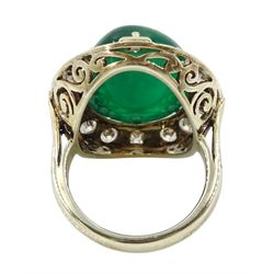 Gold emerald and diamond ring, the central oval cabochon emerald, with sixteen round and rectangular cut diamond halo surround by Judith Crowe, hallmarked 9ct, emerald 20.00 carat, total diamond weight 2.00 carat, with World Gemological Institute report