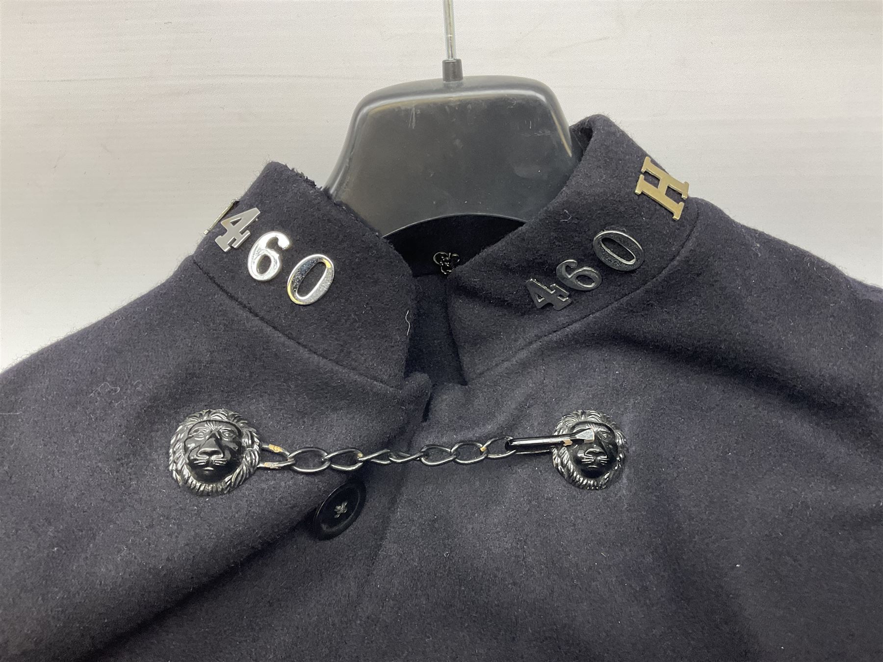 Hull City Police - vintage tunic with matching cape, collar no.H460; another tunic with WW2 medal ribbon bar; early sergeant's tunic; and later sergeant's tunic (5)