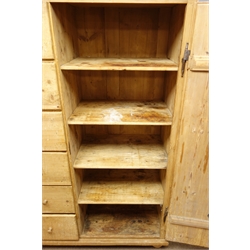 19th century French pine farmhouse larder cupboard, projecting cornice, six drawers, alongside full length cupboard with two circular vents, enclosing four shelves, on bun feet, W117cm, H176cm, D56cm  