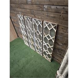 Four 19th century cast iron windows, lattice glazed in white painted finish, 