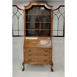 Early 20th century mahogany bureau bookcase, two glazed doors, single fall front enclosing fitted interior above three graduating drawers, ball and claw feet
