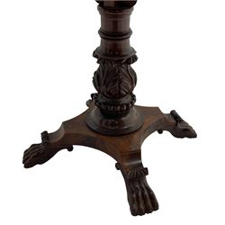 Unusual William IV mahogany Sutherland table, figured and book-matched rectangular drop-leaf top on cylindrical barrel movement, turned roundels to each end, on turned pedestal with acanthus carved baluster, shaped platform with four extended paw feet