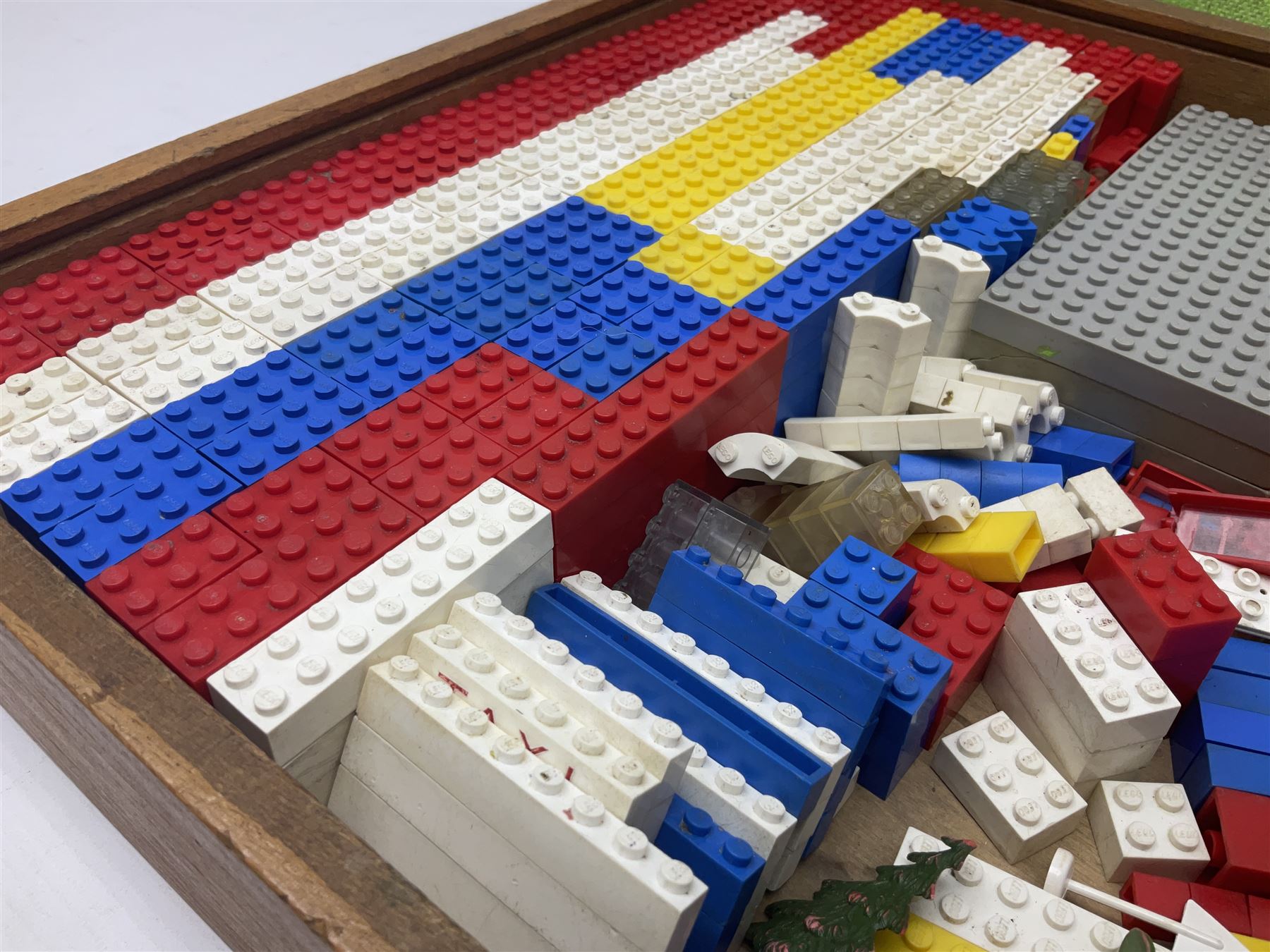 Lego - quantity of loose sections including various size blocks, base plates, windows, axles with wheels, alphabet/number blocks etc; in wooden box