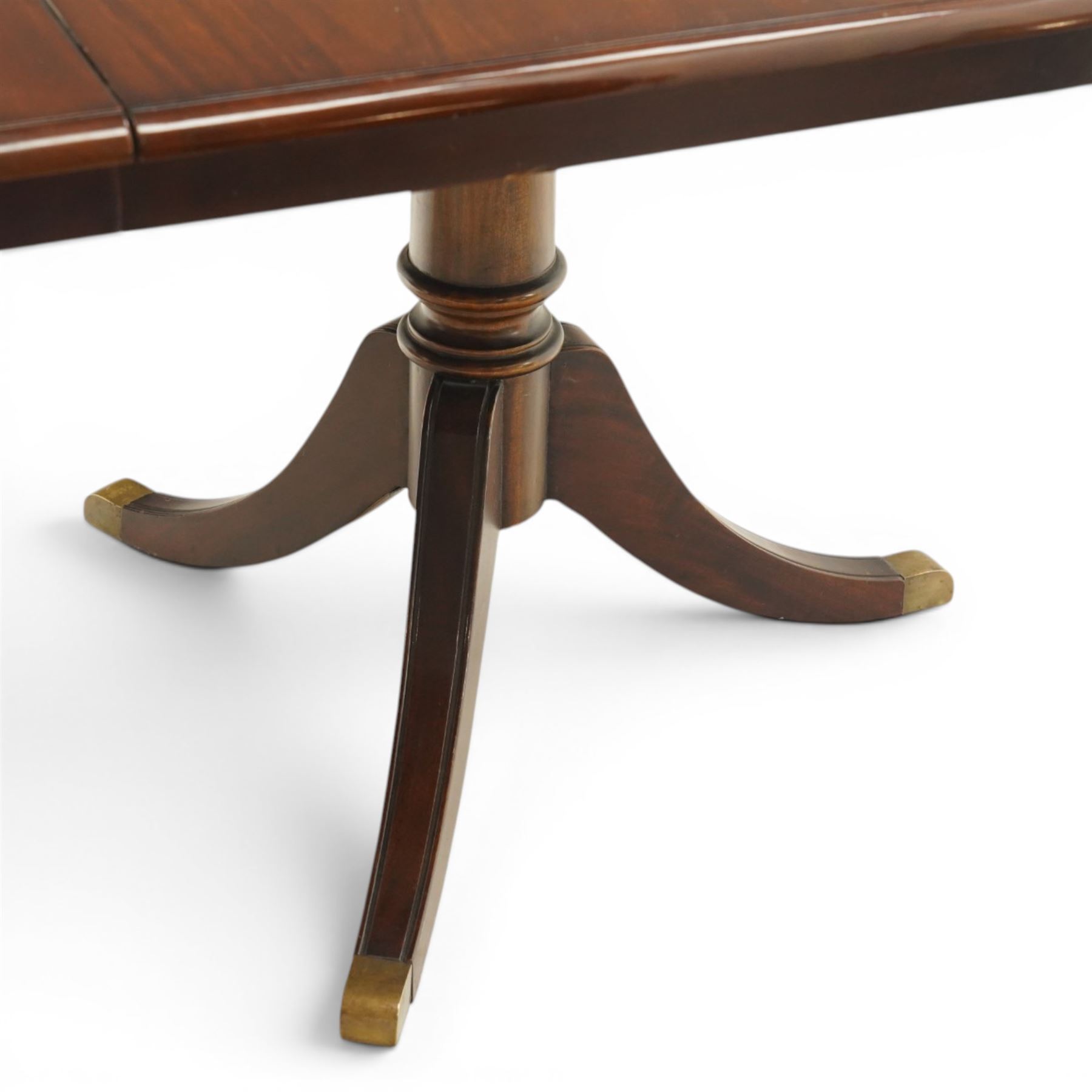 Georgian design mahogany twin pedestal extending dining table, rectangular rounded top on twin tripod pedestals with splayed supports, with additional leaf (W170cm D115cm H77cm); with set six (4+2) matching mahogany framed cameo-back dining chairs, upholstered in pale yellow lozenge patterned fabric (W57cm H94cm)