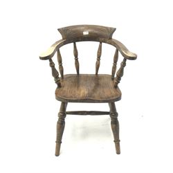 19th century elm Captains chair, turned supports joined by stretchers