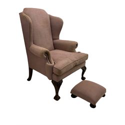 Georgian style wingback armchair, upholstered in fabric light purple fabric, on ball and claw carved front supports, with matching footdtool