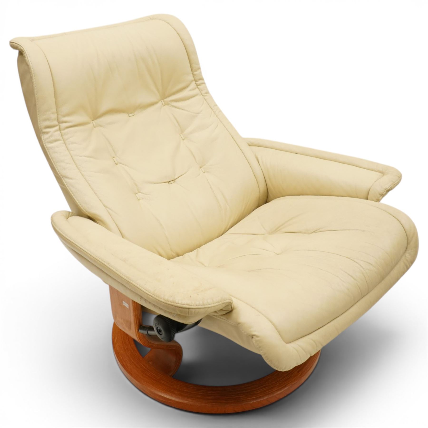 Ekornes - Stressless cream leather upholstered reclining armchair together with a matching stool