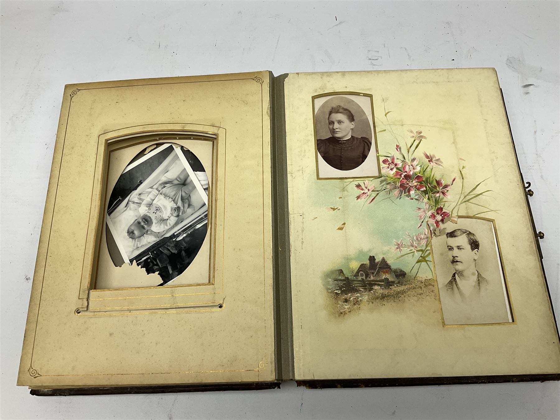 Victorian leather bound musical photo album, together with another victorian photo album, with photographs 
