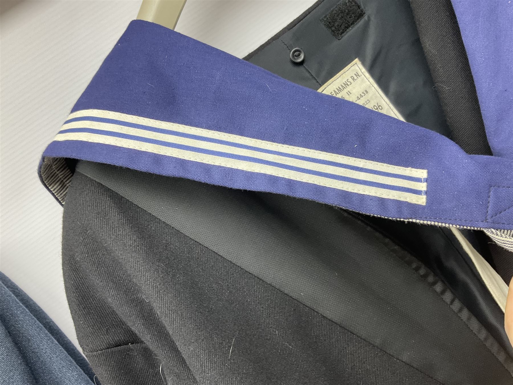 Five military uniforms comprising German Wachbataillon tunic, RASC No.2 dress tunic dated 1963, RAF tunic and trousers dated 1974, RE No.1 tunic and RN Seamans jumper Class II (5)