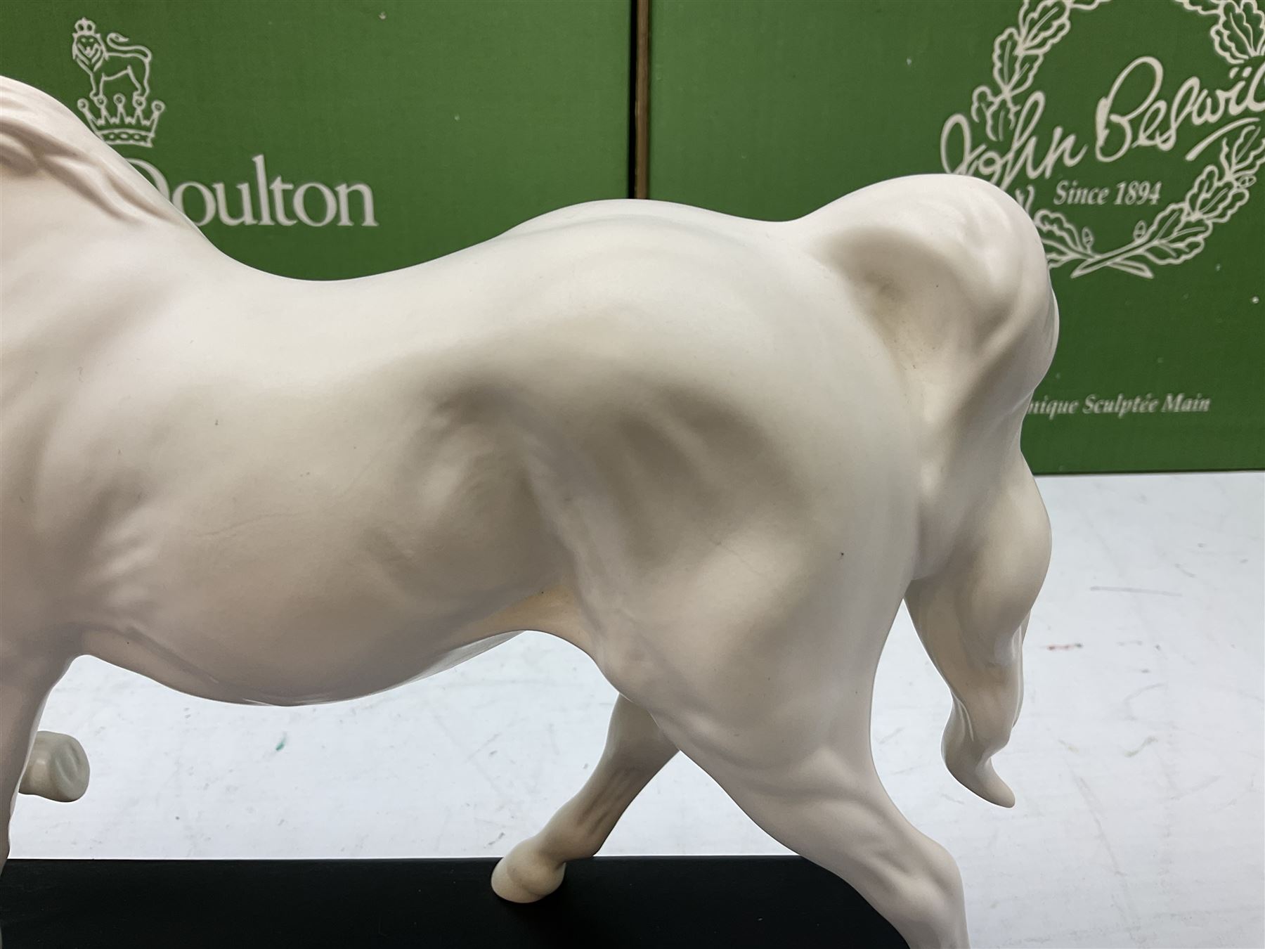 Five Beswick and Royal Doulton horse figures in matt white on black plinths, comprising of  Spirit of Affection no. 2689/2536, Springtime no.2837, Spirit of peace no.2916, Spirit of earth no.2914 and Spirit of the wild no. 183, together with a composite figure of a horse (6)