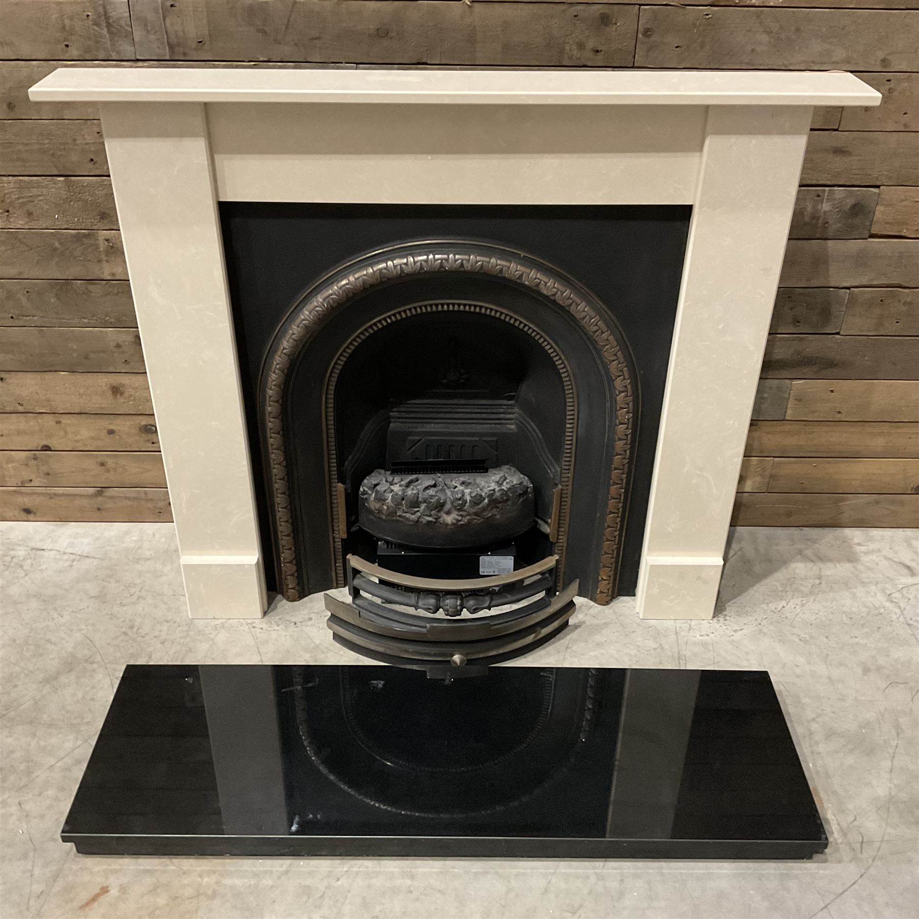 Aurora Dorchester Black Fire suite - granite style surround with cast iron insert, electric fire with remote and black hearth