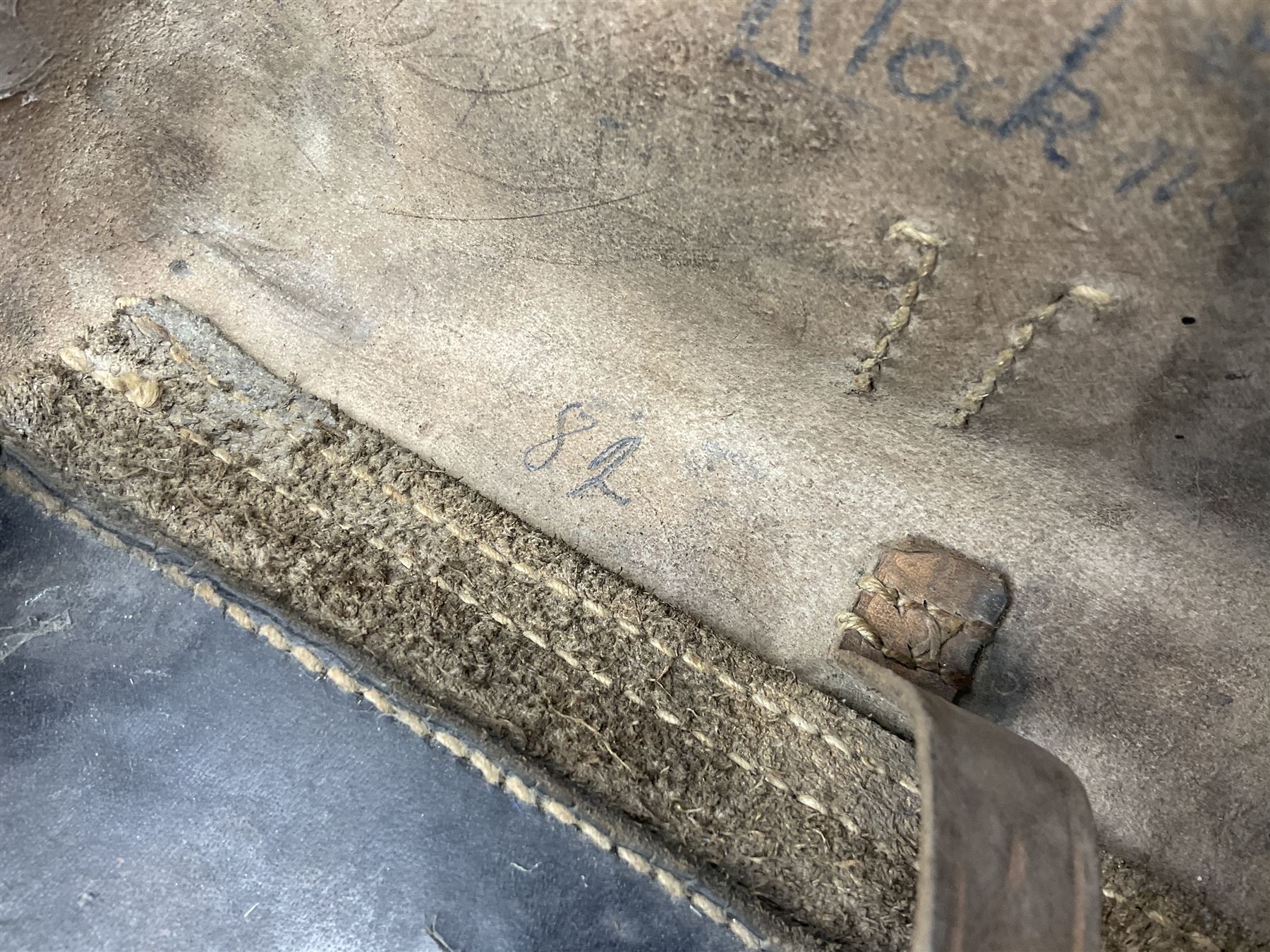 WWII German brown leather holster with side magazine pouch for a Walther P.38 semi-automatic pistol, stamped P38 and OWX 1941 on back L24.5cm