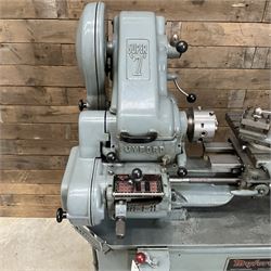 Myford Super 7 metal turning lathe with extensive collection of attachments, chucks, collets, bits; and precision metal saw
