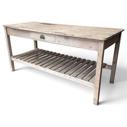 Large 19th century painted pitch pine scullery table, rectangular triple plank top fitted with single drawer, raised on square supports united by slatted under-tier