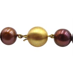 Single strand chocolate pearl necklace, with 9ct gold clasp and a pair of matching 9ct gold stud earrings, retailed by Barbara Cattle, York, boxed