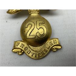 WW1 25th Battalion (Frontiersmen) City of London Royal Fusiliers Cap Badge; gilt brass fused grenade with 25 to the centre; circular section to the flames with red enamel cross and enamel union flag with GOD GUARD THEE to the centre; lower scroll with FRONTIERSMEN; two lug fittings verso.