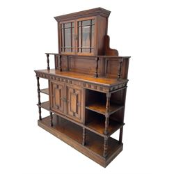 Collinson & Lock London - late 19th century walnut side cabinet, central upper display cabinet enclosed by two astragal glazed doors, ring turned supports, rectangular moulded top with dentil frieze over cupboard enclosed by geometric panelled doors and open shelves, plinth base, the cupboard door stamped 