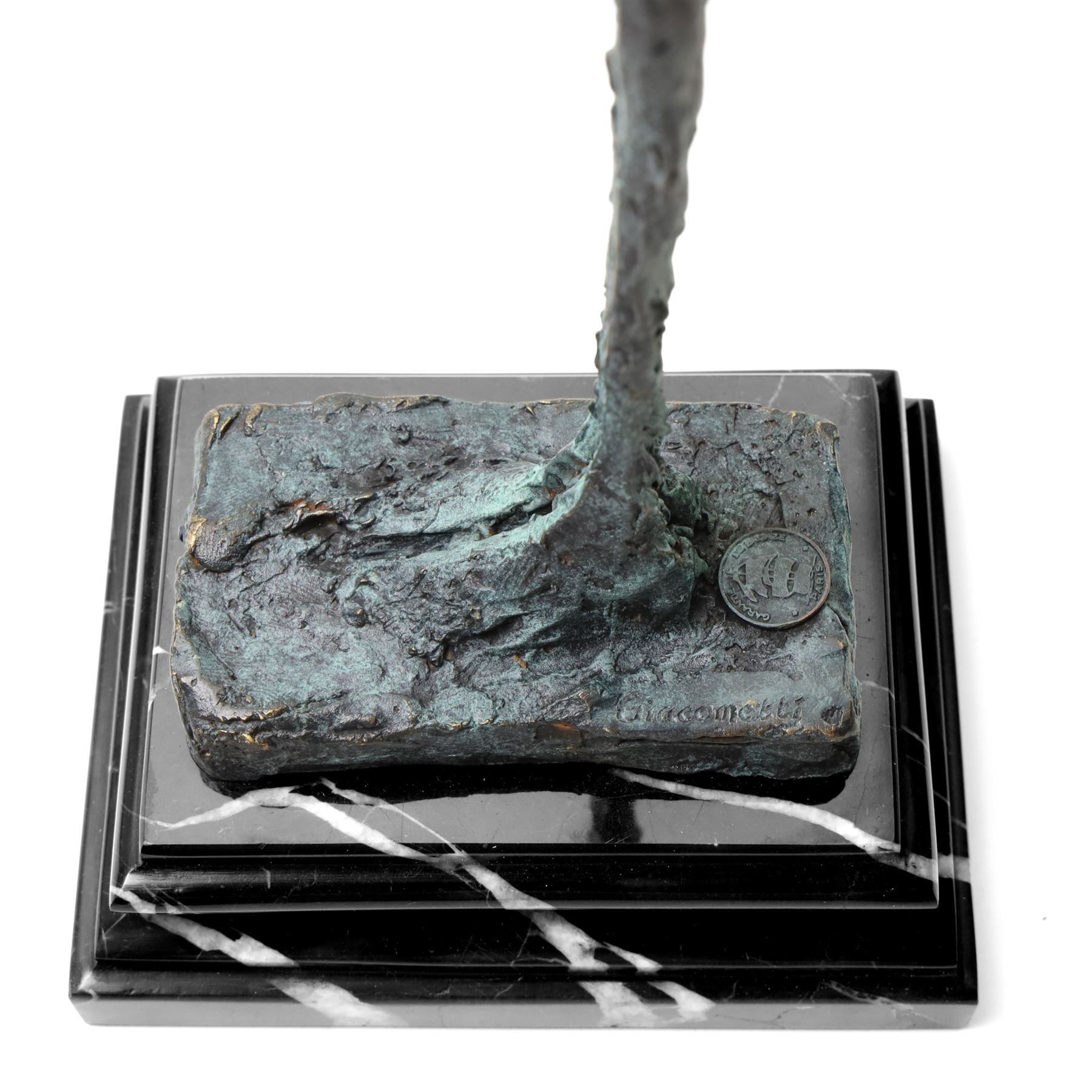 After Alberto Giacometti (Swiss 1901-1966): Femme Venise bronze upon a stepped marble base, overall H49cm