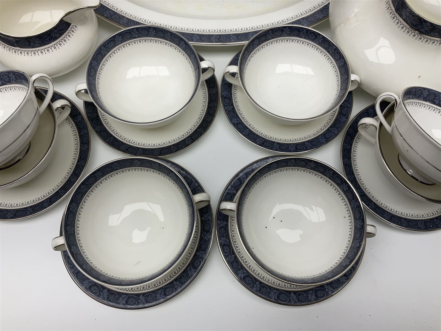 Royal Doulton Sherbrooke pattern part dinner and tea service, to include teapot, ten twin handled soup bowls and saucers, two serving platters, three twin handled covered dishes etc (63)  