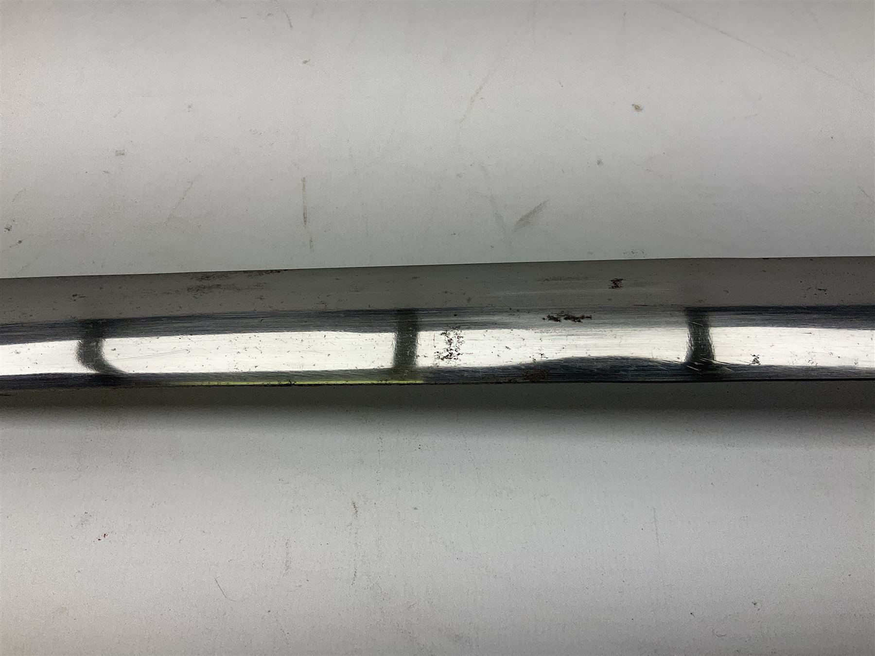 Reproduction Scottish basket hilted broadsword with 85cm double edged steel blade and red lined basket hilt with wire bound grip, in white metal mounted leather scabbard 107cm overall