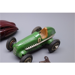  Two Schuco clockwork tin-plate cars - Schuco Fex 1111 in maroon with 'cranking handle' key L15cm and Studio 1050 Mercedes Benz racing car with key, made in US Zone, both unboxed (2)  