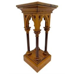 19th century pitch pine ecclesiastical pedestal stand, the square chamfered top over cusped Gothic pointed arches and four turned column supports, stepped and moulded plinth base