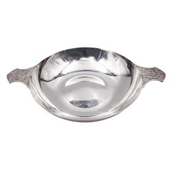 Large modern silver Quaich, of circular form with twin handles cast with stylised dragon motifs, hallmarked Birmingham 2009, makers mark W&W, D18cm, approximate weight 11.14 ozt (346.8 grams)