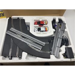 Scalextric - Formula One set with McLaren Mercedes and Williams BMW cars; and Speed Extreme set with Ford Focus cars; both boxed with accessories and paperwork; and Parker Pro-Action football game; boxed (3)