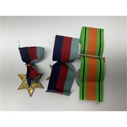Twelve WW2 medals comprising four 1939-1945 war medals, four Defence medals, three 1939-1945 Stars and Africa Star; all with ribbons; some as groups in two issue boxes with slips