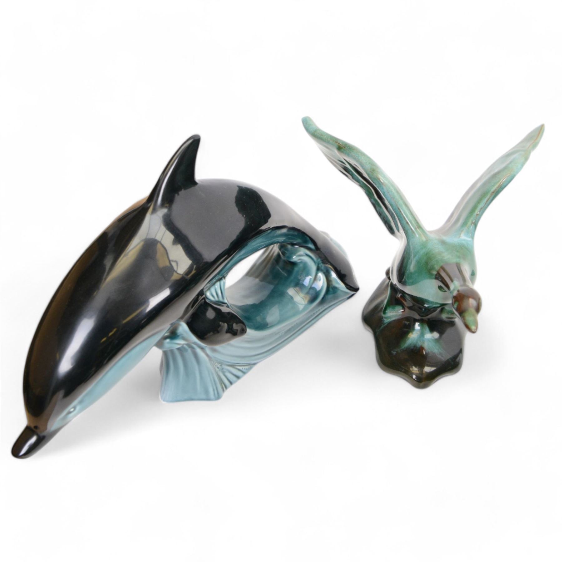 Collection of Blue Mountain Pottery, including owls, buffalo, deer etc, together with Poole Pottery Dolphins, owls frog etc 