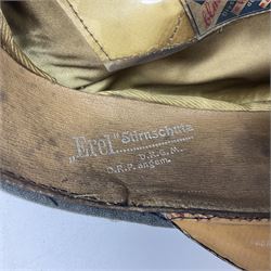 WW2 German Infantry Officer's visor cap with cloth insignia; labelled and stamped Offizier Kleiderkasse Berlin and Erel Stirnschutz