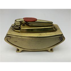 Ronson gilt metal table lighter, together with a silver-plate table lighter in the form of a football boot
